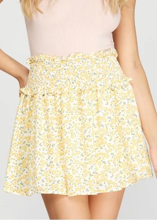 Woven print smocked mini skirt with short lining with white background 