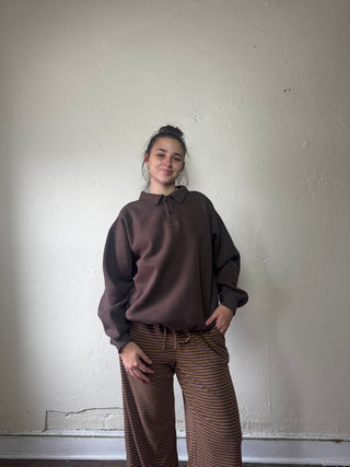 OLIVACEOUS Harbor Rugby Sweatshirt in dark brown, long sleeve top with a classic rugby design and comfortable fit.