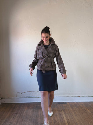 She + Sky Modern Muse sleeveless sweater dress in DMIN, featuring a stylish fit and cozy knit fabric, shown on a model.